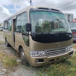 golden color 30 passengers diesel bus