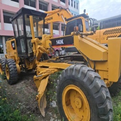 CAT 140K grader